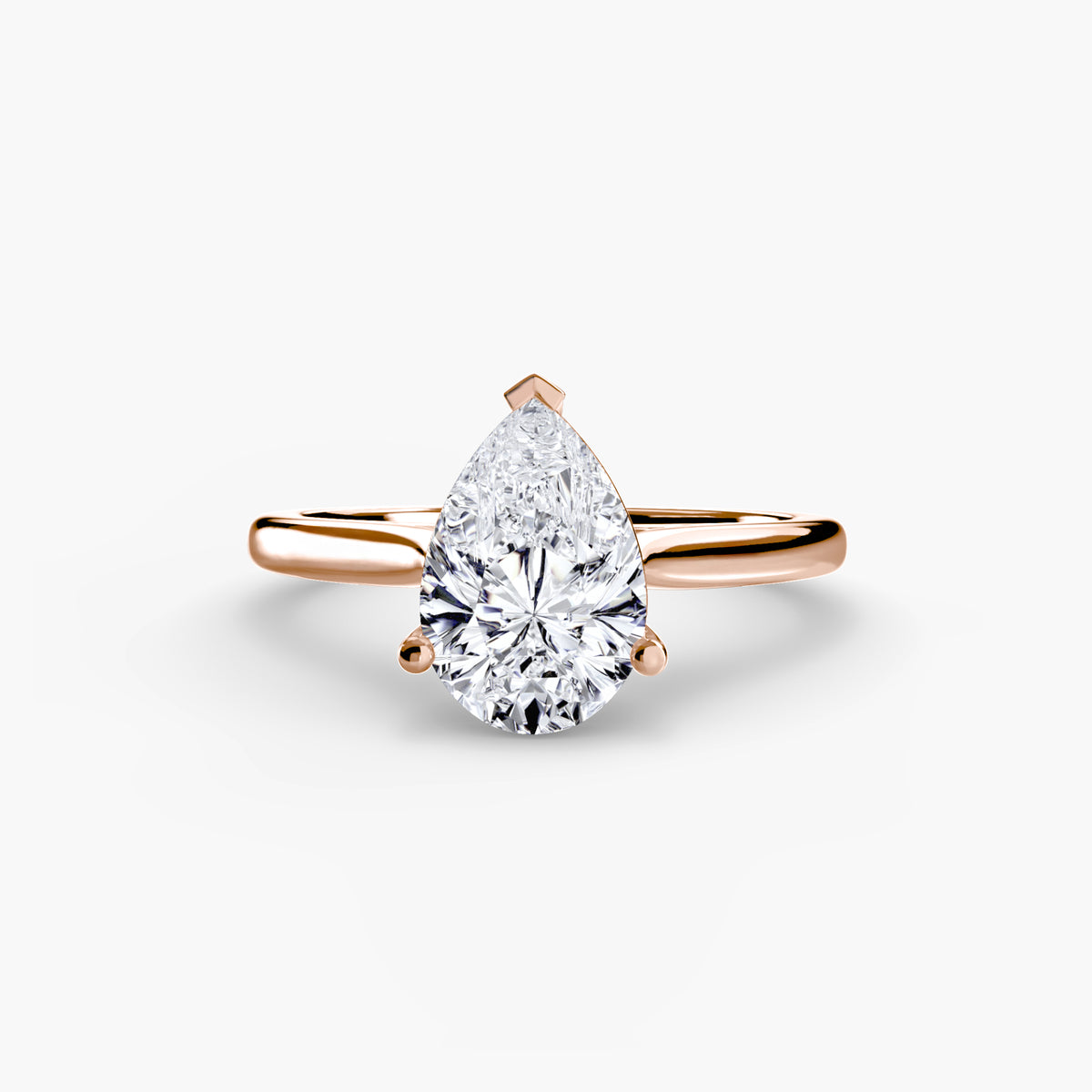 Clementine pear solitaire in rose gold