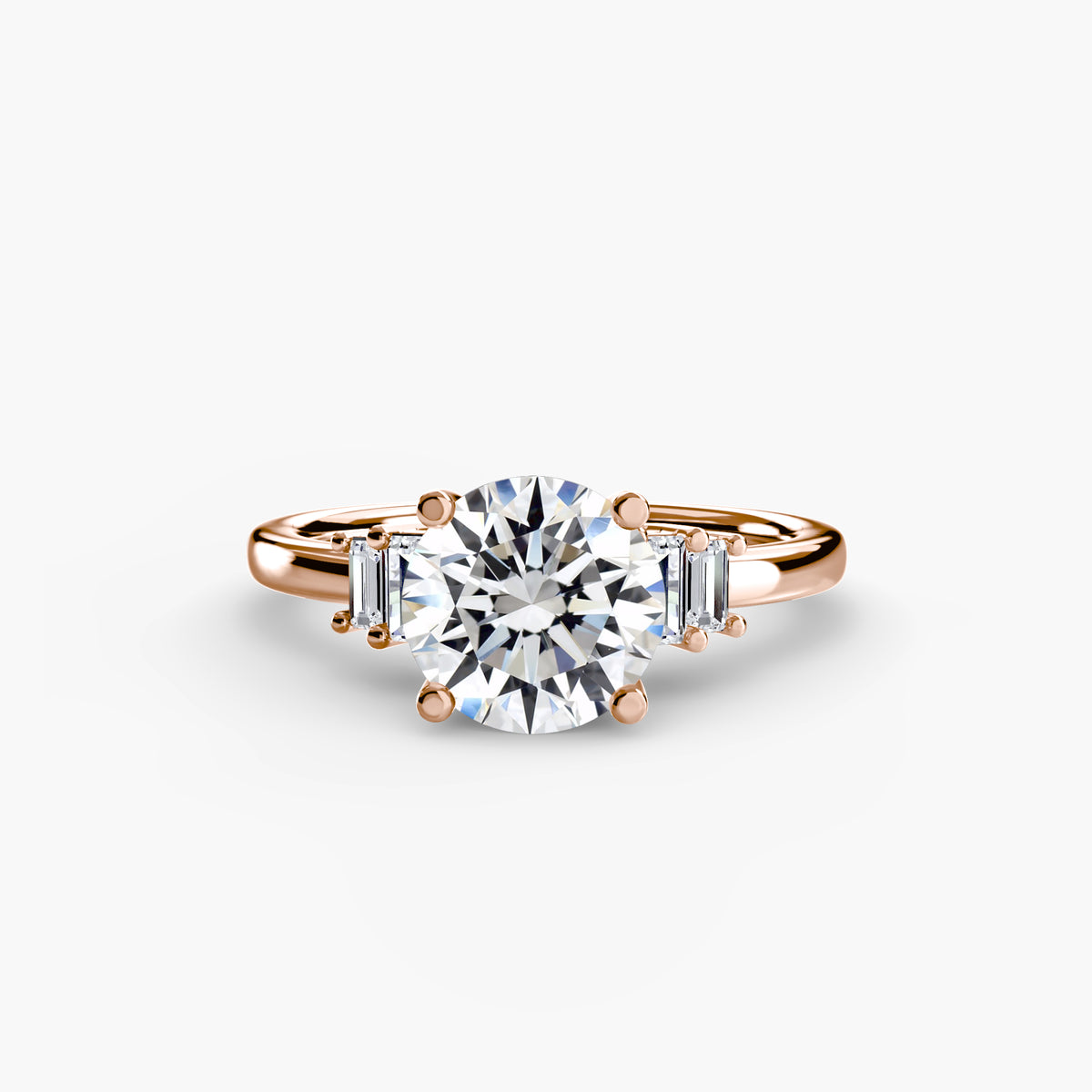 cordelia round baguette accent solitaire in rose gold