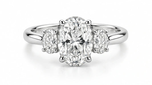 Oval three-stone engagement ring