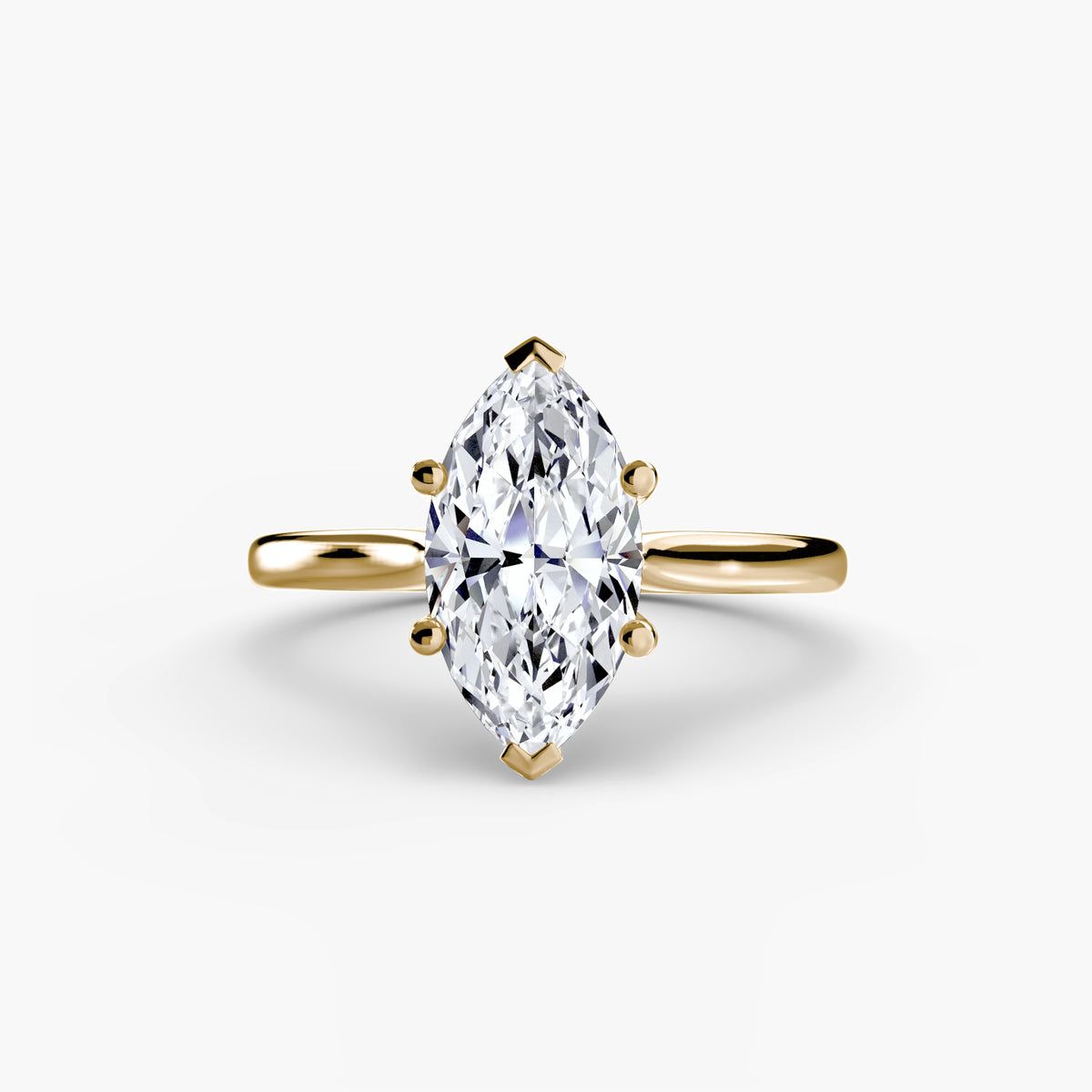 Zola Marquise Four-Claw Solitaire in yellow gold