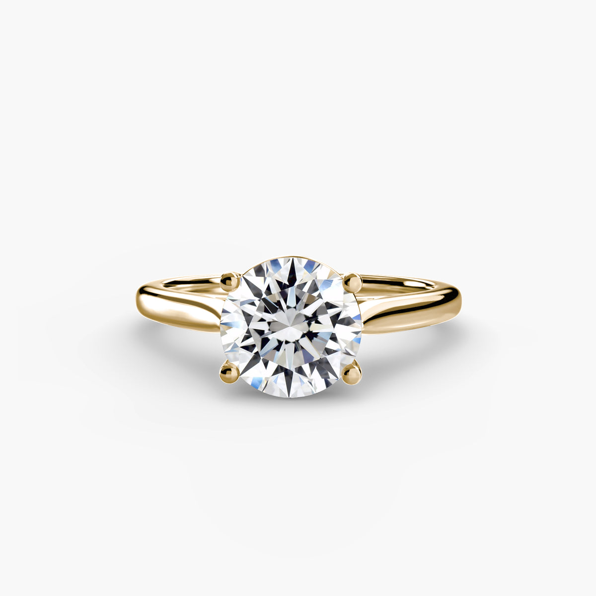 Gigi Round Four-Claw Solitaire in yellow gold