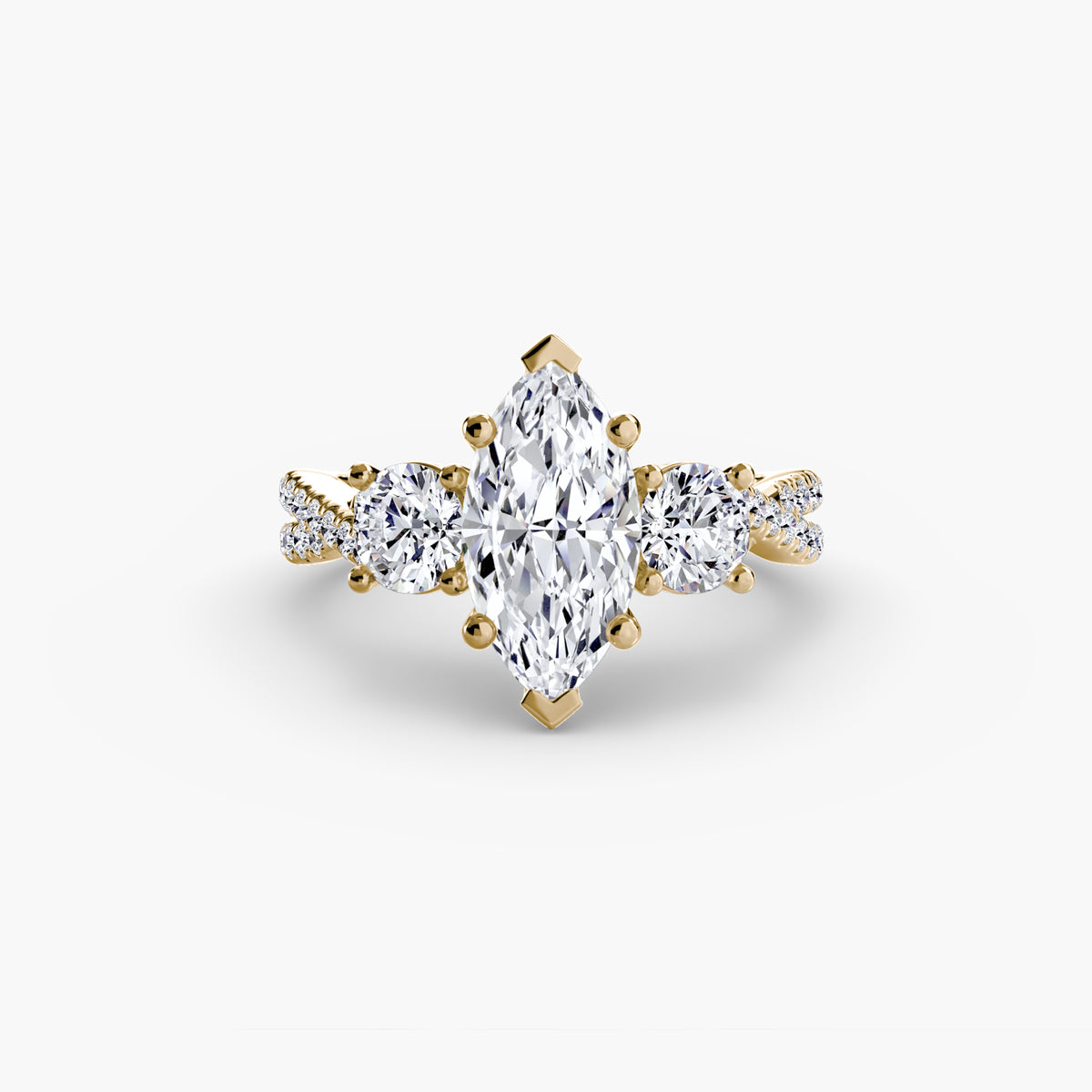 Odette Marquise Three-Stone Pavé in yellow gold