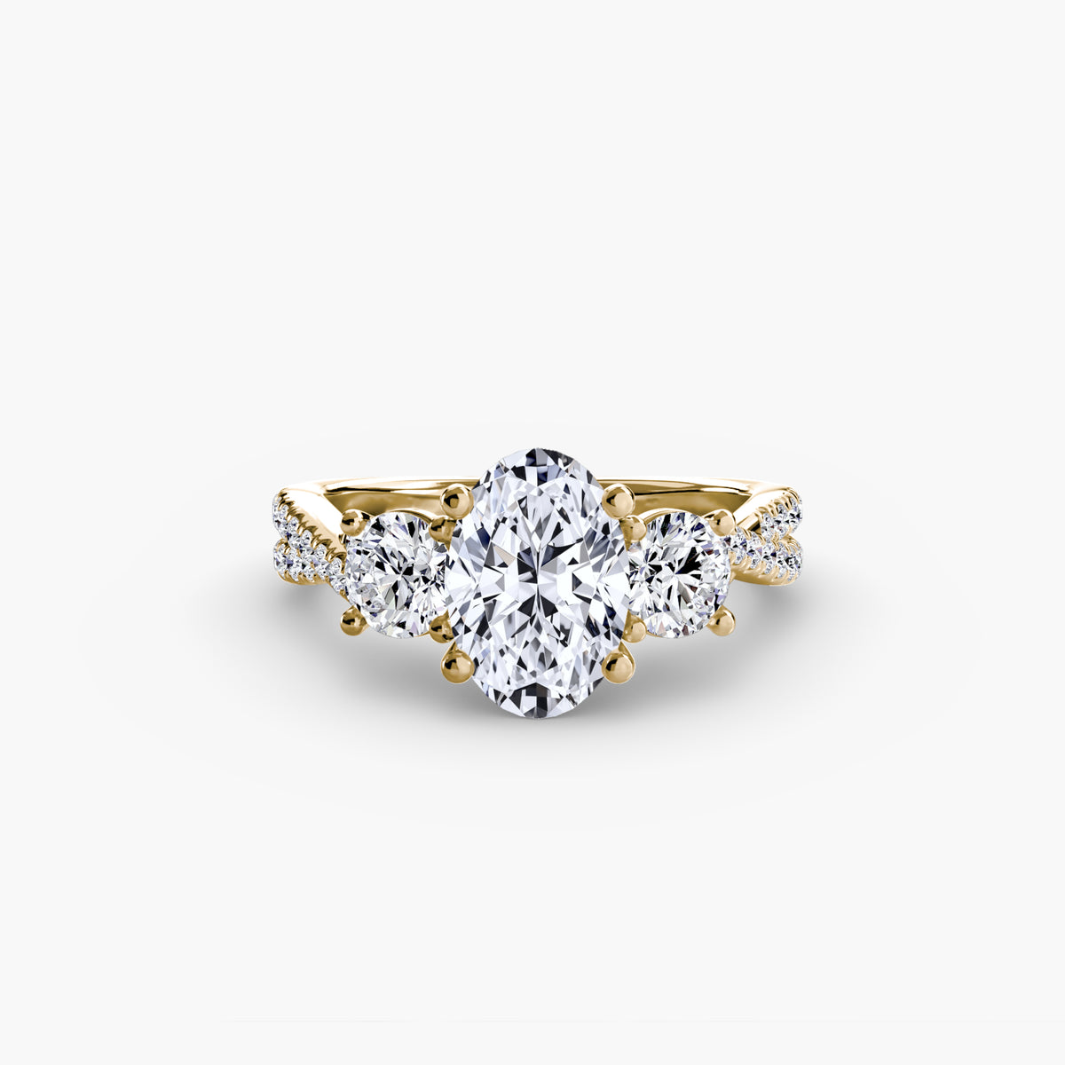 Imogen Oval Three-Stone Pavé in yellow gold
