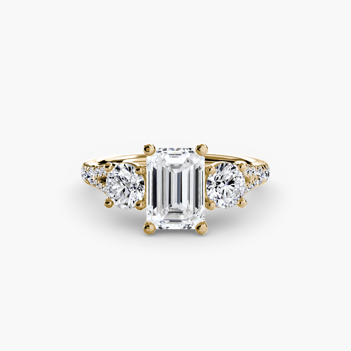 Alba Emerald Three-Stone Fine Pavé in yellow gold