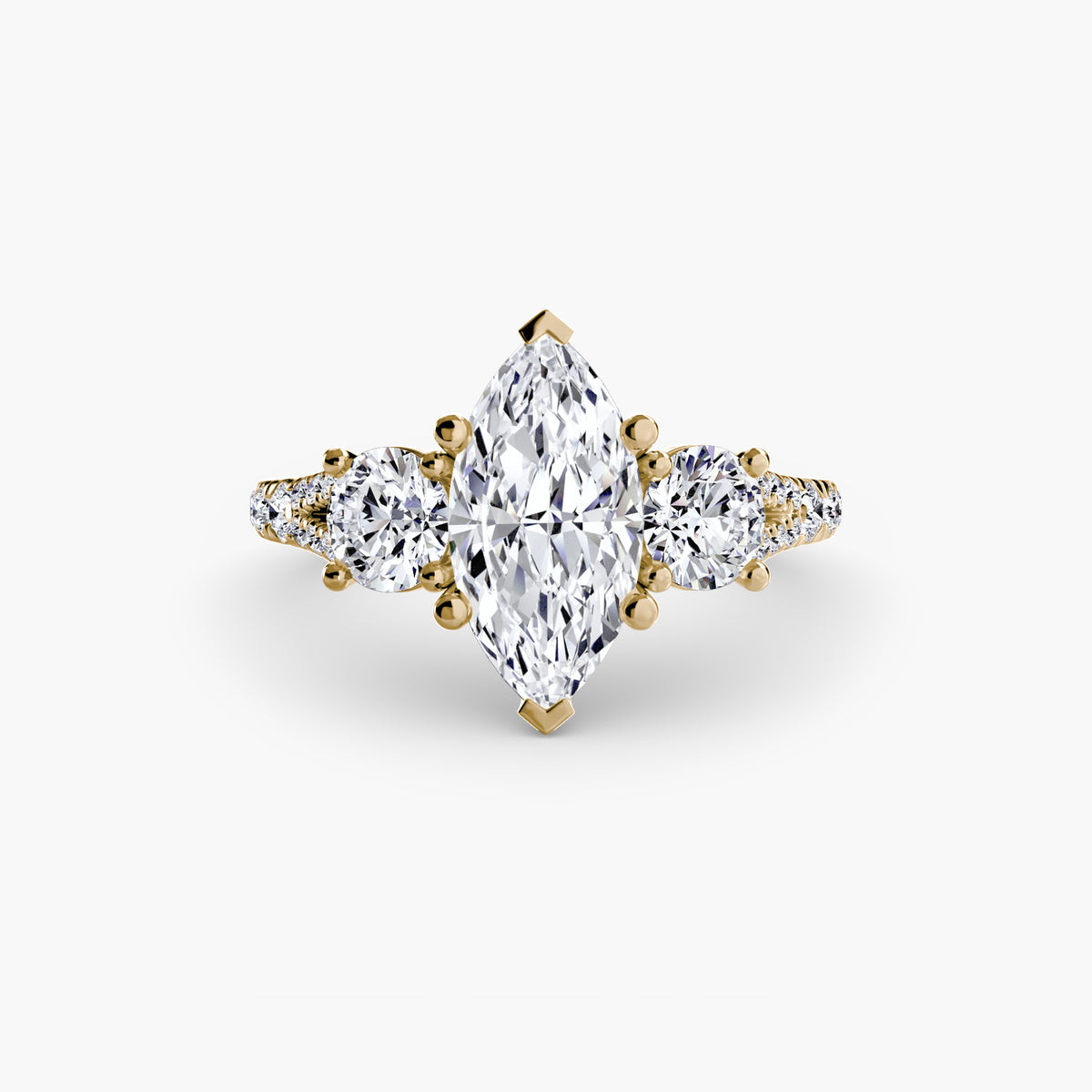 Mae Marquise Three-Stone Fine Pavé in yellow gold