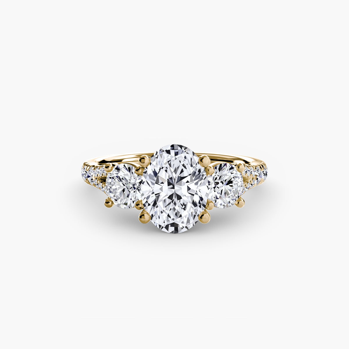 Evie Oval Three-Stone Fine Pavé in yellow gold