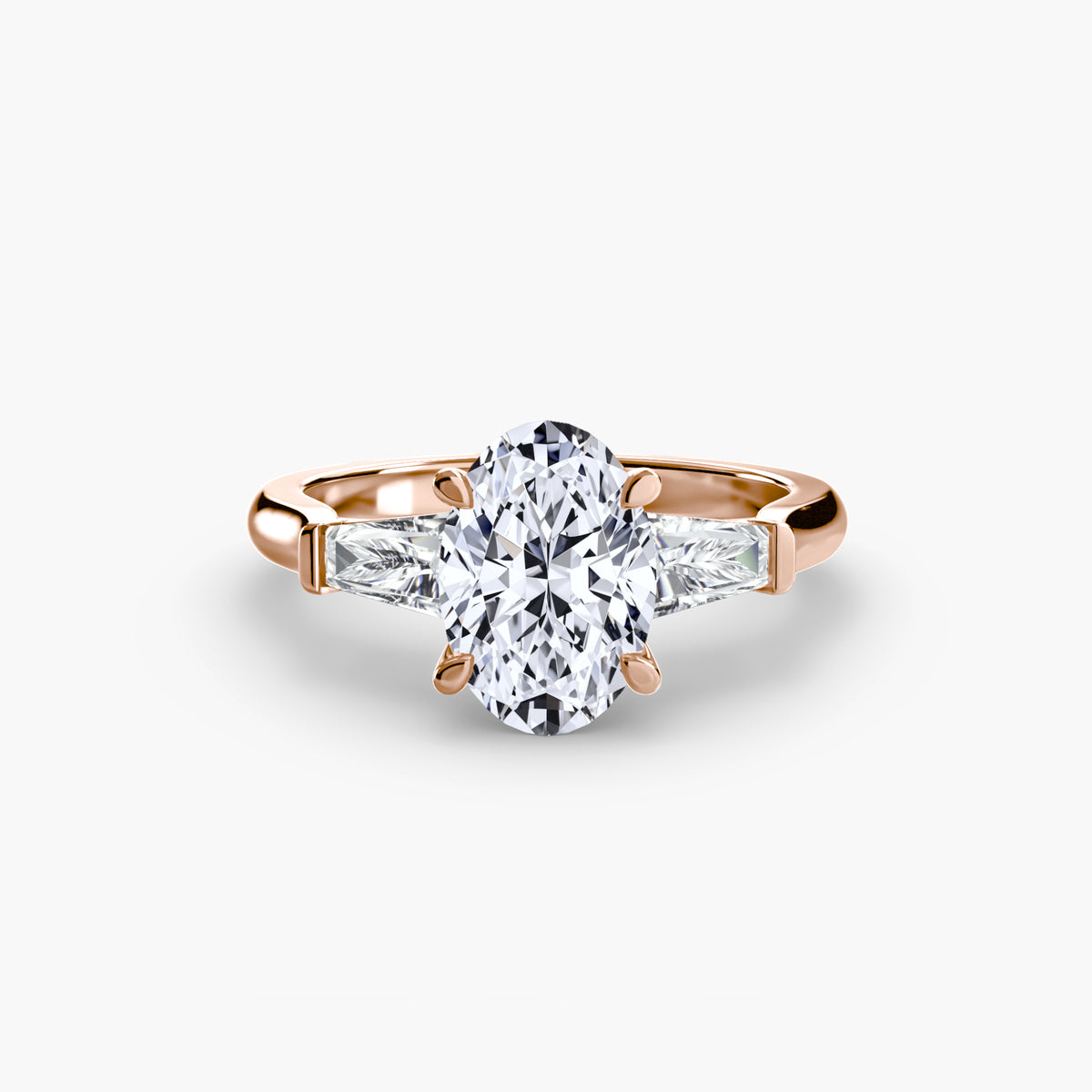 Camille Oval Three-Stone Baguette in rose gold