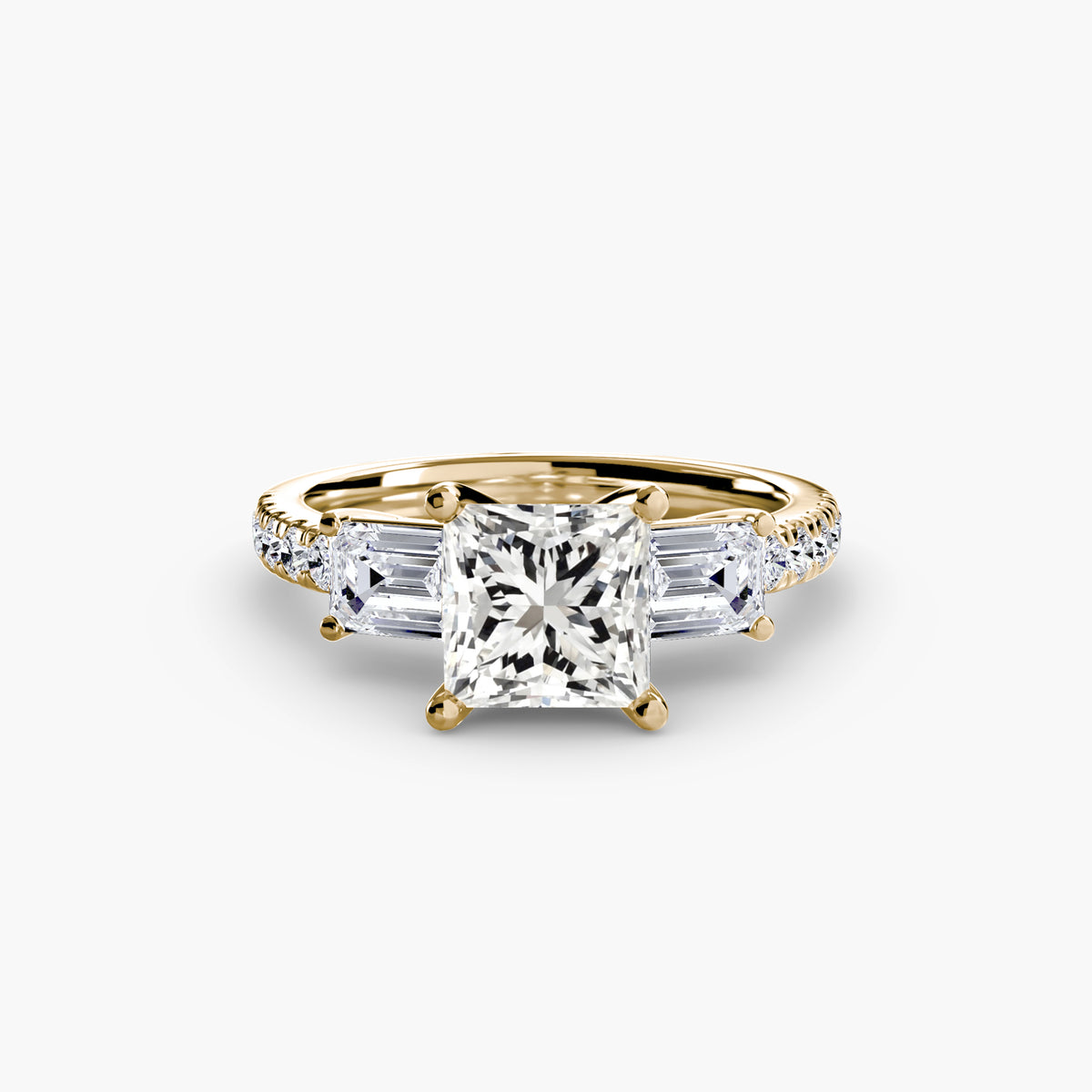 Fern Princess Grand Three-Stone in yellow gold