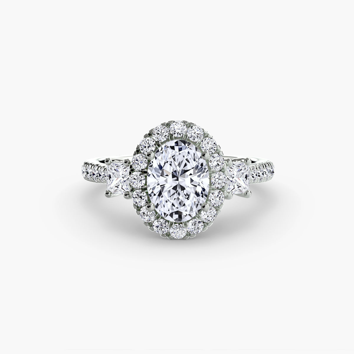 Aurore Oval Three-Stone Halo in white gold