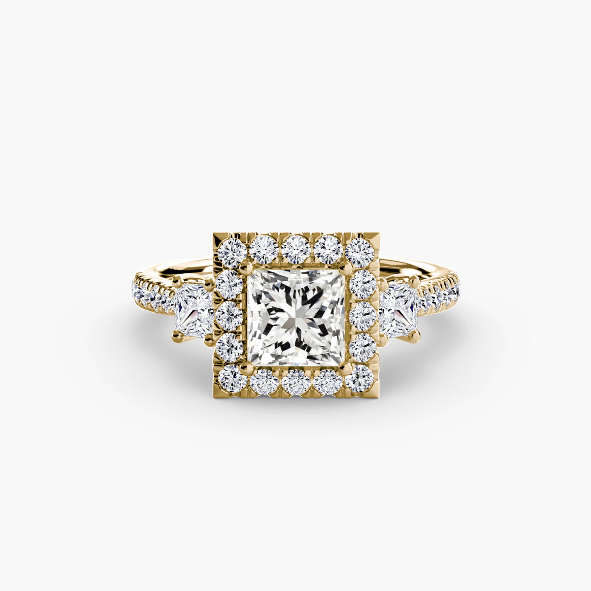 Rosalind Princess Three-Stone Halo in yellow gold