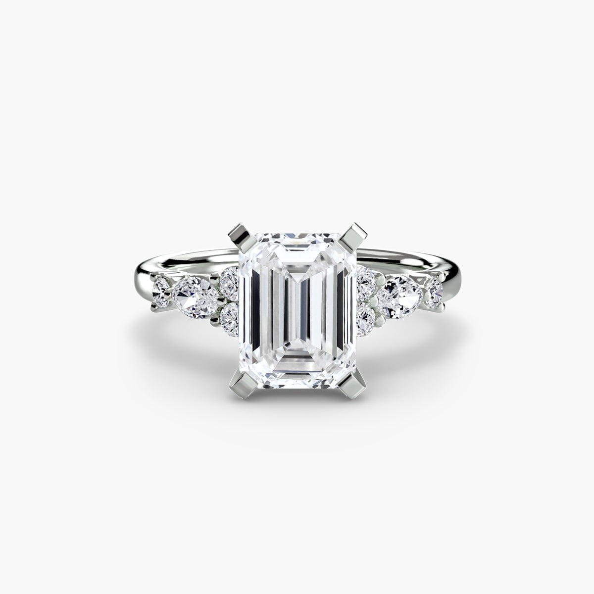 Gabrielle Emerald Floral Solitaire in white gold