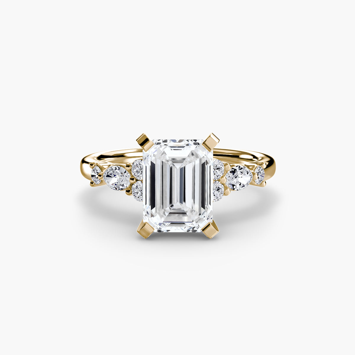 Gabrielle Emerald Floral Solitaire in yellow gold