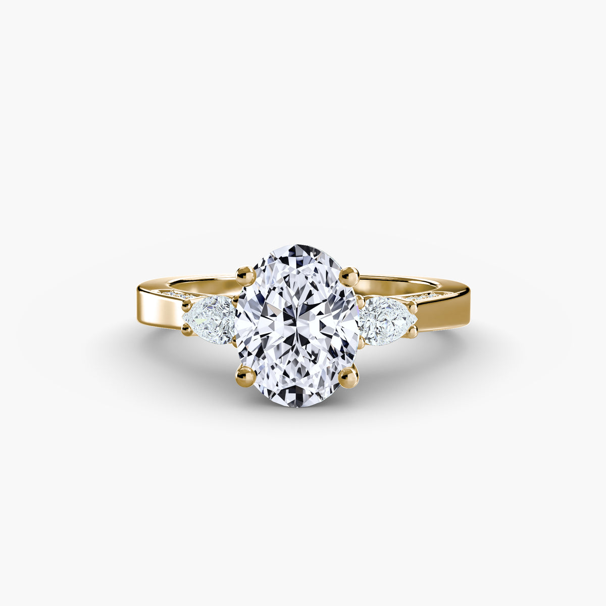 Mimi Oval Baguette Trilogy in yellow gold