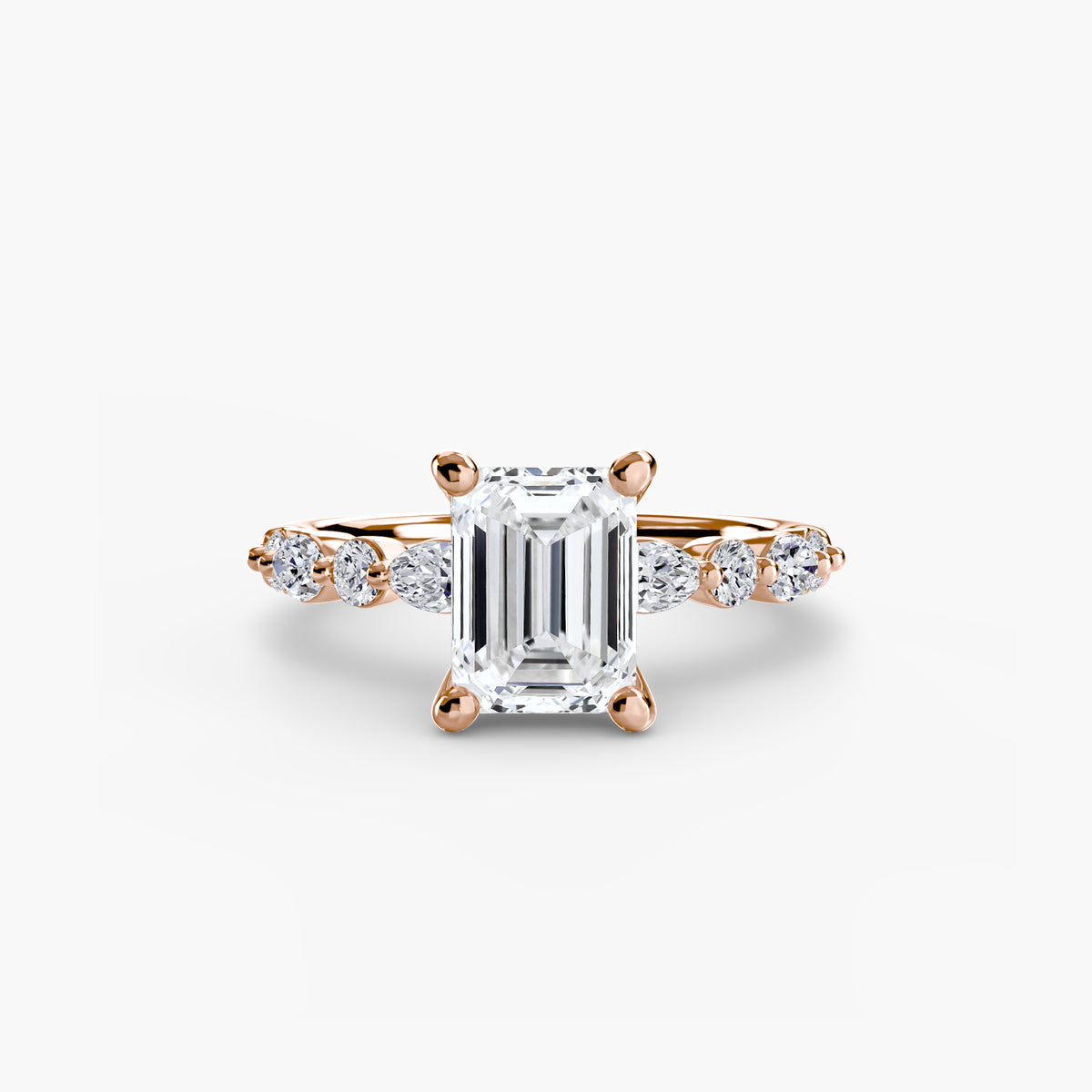 Eden Emerald Diamond Band Solitaire in rose gold