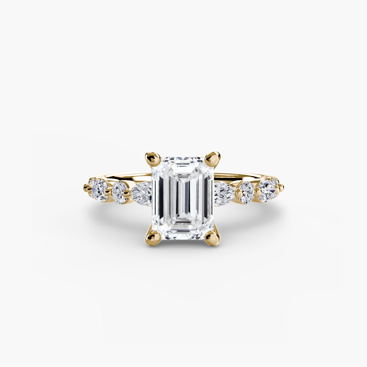 Eden Emerald Diamond Band Solitaire in yellow gold